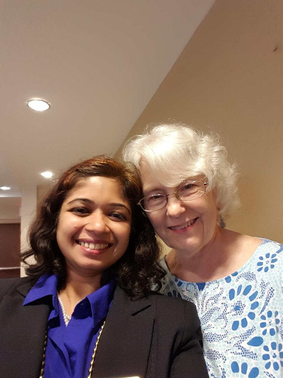 Geetha Krishnan with a fellow guest at a conference
