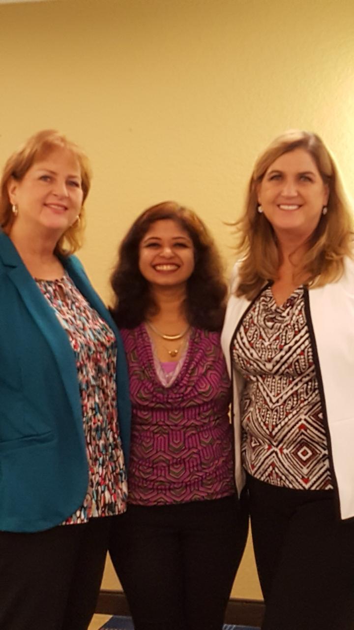 Geetha Krishnan with fellow guests at a professional gathering