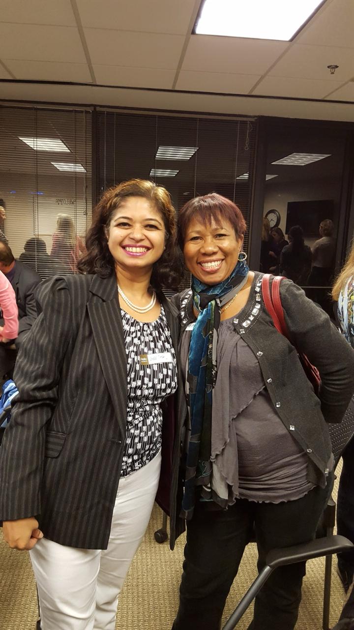 Geetha Krishnan with a fellow attendee at an evening networking event